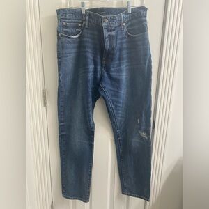 Men’s straight leg jeans. Slightly distressed.